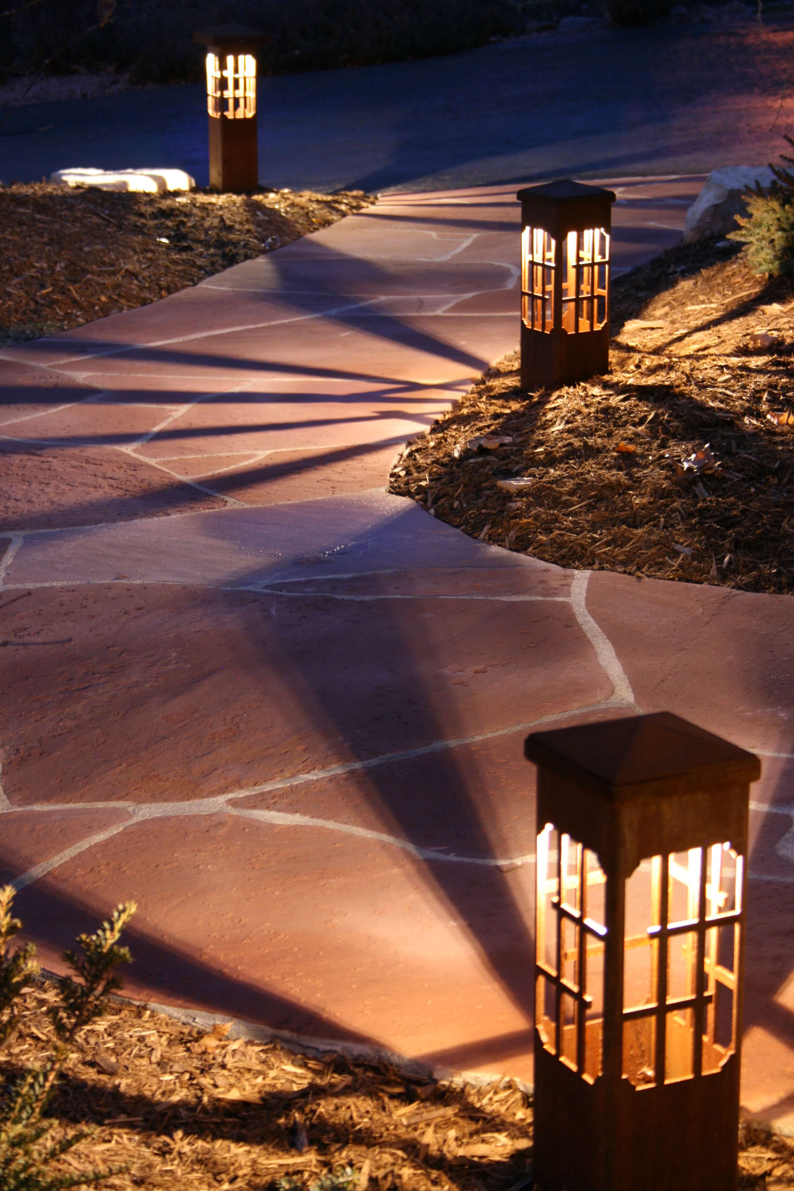 outdoor ground lantern lighting on stone pathway in wilmington de